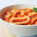 squid stew in white bowl