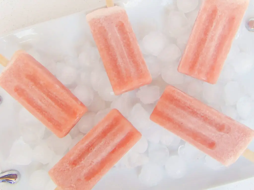 5 bone broth popsicles laying on ice