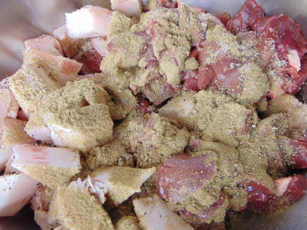 Meat, fat and spice mixture used to mak eorgan meat sausage