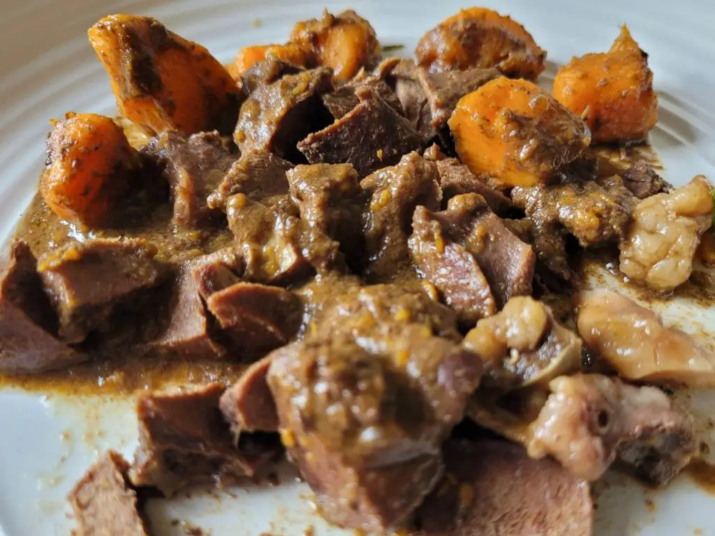 Serving of Beef Heart Stew on white plate
