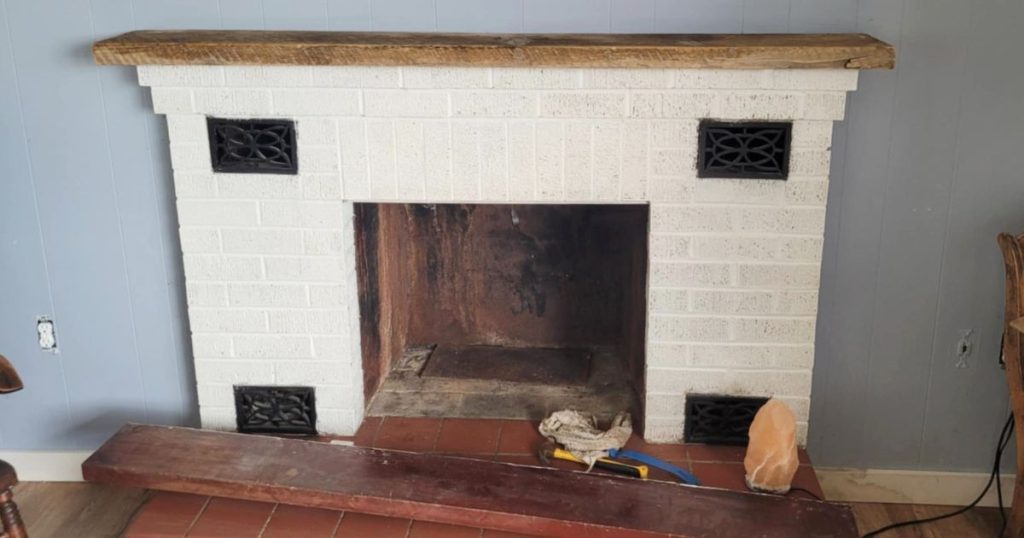 Replacing wooden mantle with weathered wood on old brick fireplace